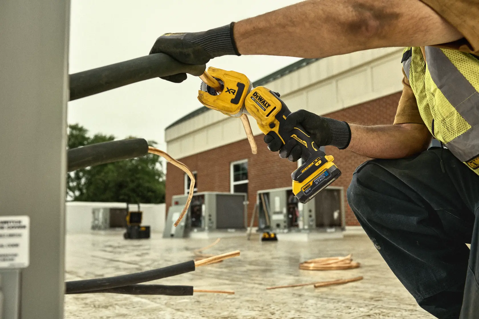 DEWALT DCE154N, DCE154N-XJ cutting tool used outdoors on cables. Photography product category.