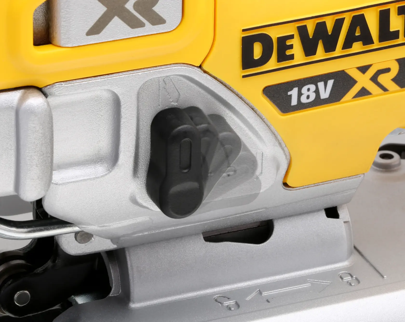 Close-up of DEWALT 18V XR power tool showing switch and brand logo detail.