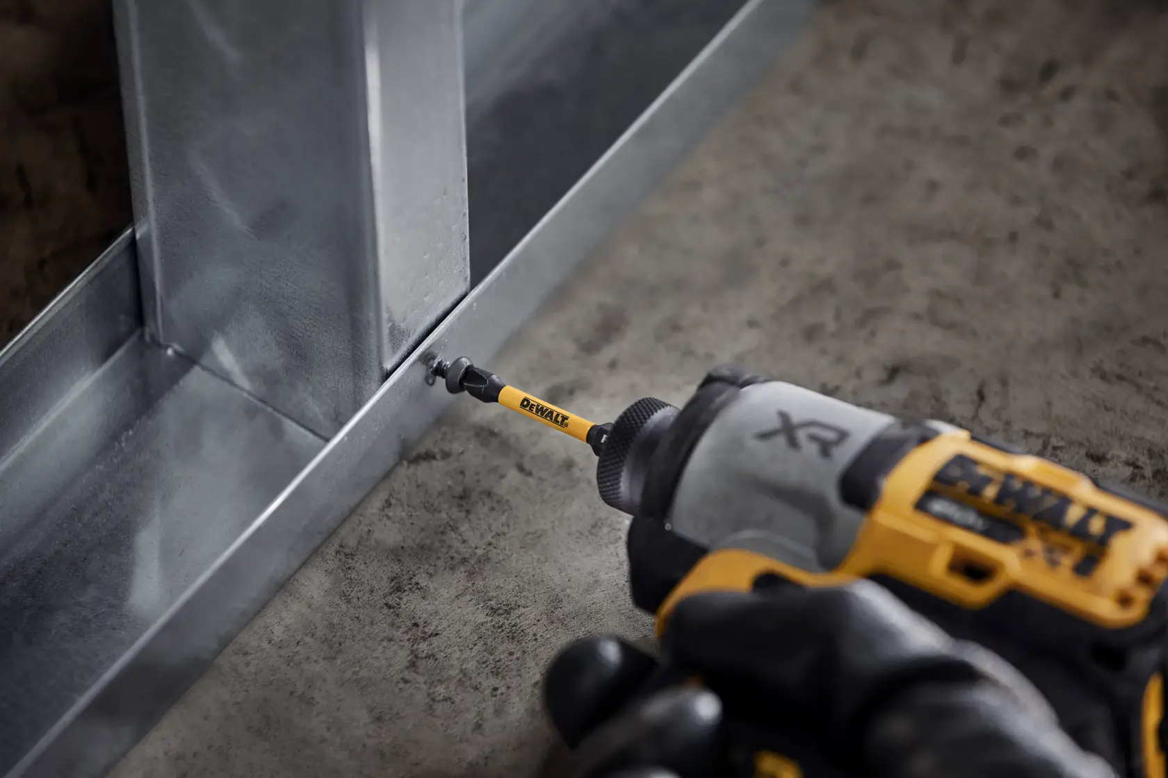 Graphic showing DEWALT XTREME Sub-Compact Series branding with the slogan 'Compact and Performance Packed' on a yellow background.