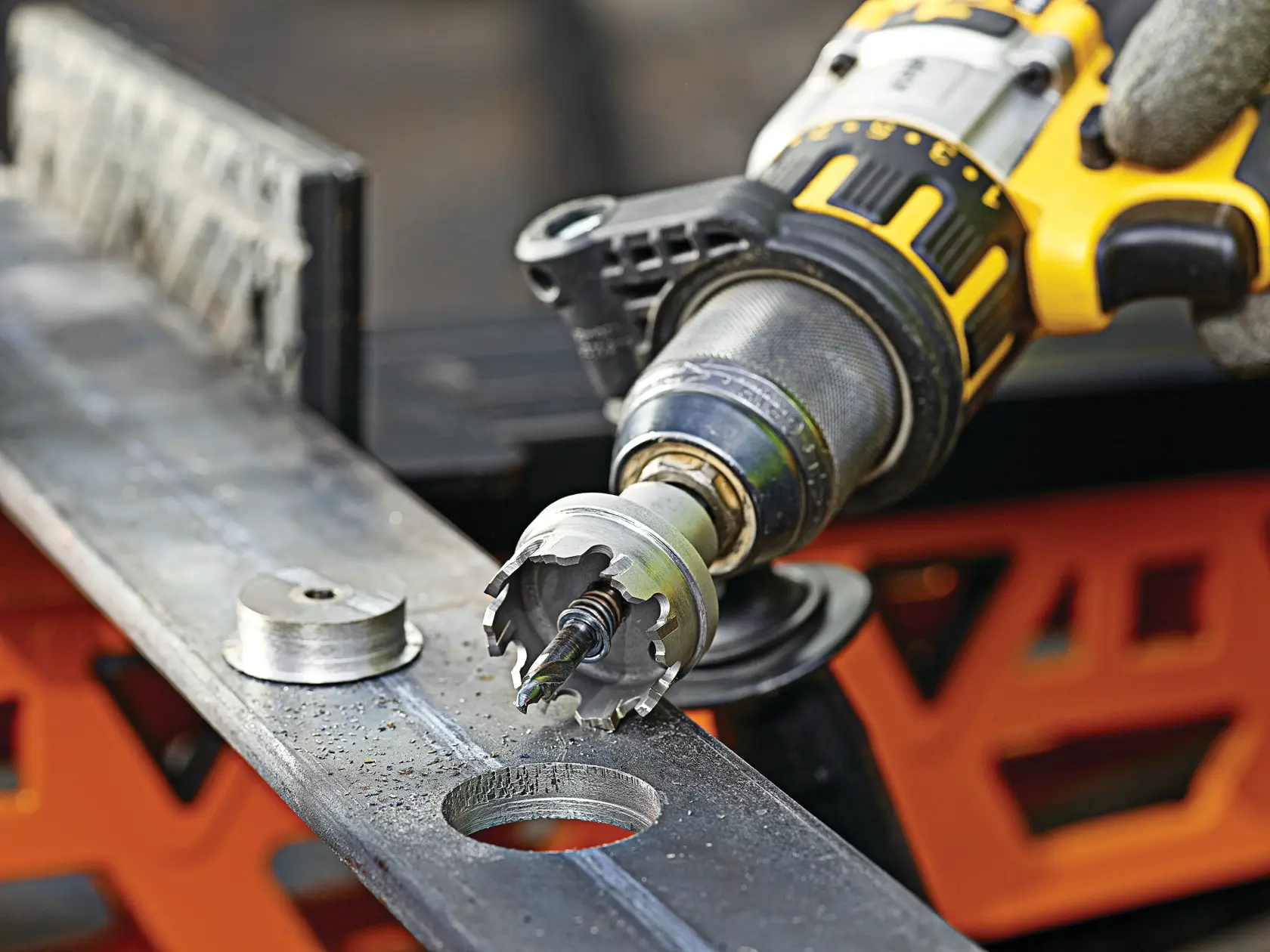 Graphic showing DEWALT XTREME Sub-Compact Series branding with the slogan 'Compact and Performance Packed' on a yellow background.