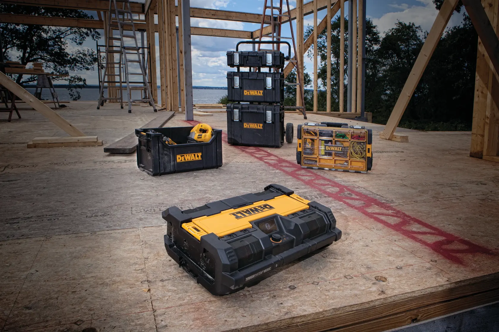 DEWALT ToughSystem 2.0 promotional graphic with the slogan 'Storage Built to Handle It' in large, bold yellow lettering on a dark, textured background.